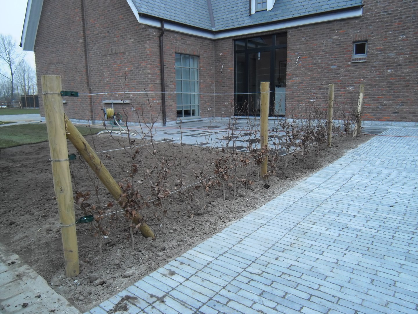 Oprit en Terrass Aanleggen in  Sint-Lievens-Houtem